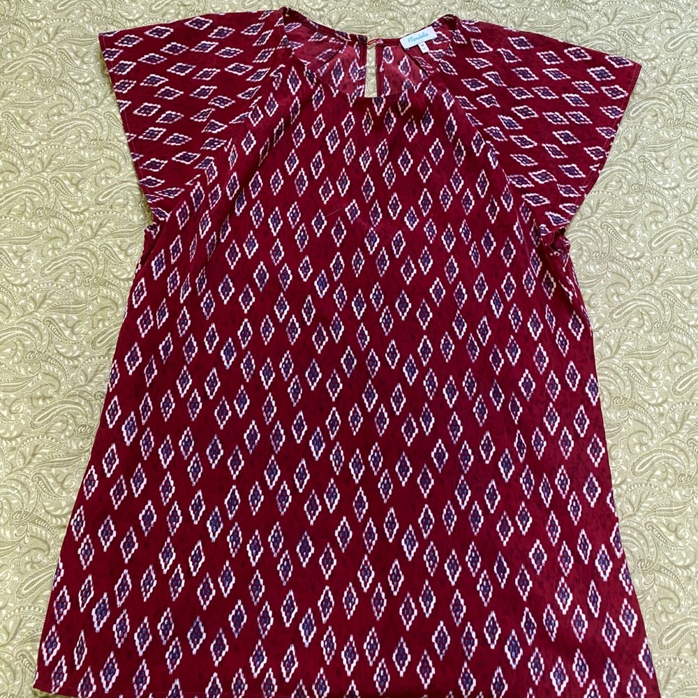 Red patterned blouse